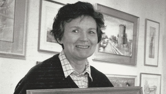 The late artist Betty Cauldwell pictured with one of her popular paintings.