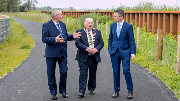 (Left-Right): Pat Dowling, Chief Executive, Clare County Council; Cllr PJ Ryan, Cathaoirleach, Clare County Council; and Patrick O'Donovan TD, Minister of State with responsibility for the Office of Public Works, in conversation at the official opening of the Ennis South Flood Relief Scheme. 