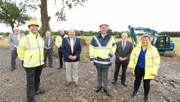Delegates at the start of the construction of the Springfield Flood Relief Scheme